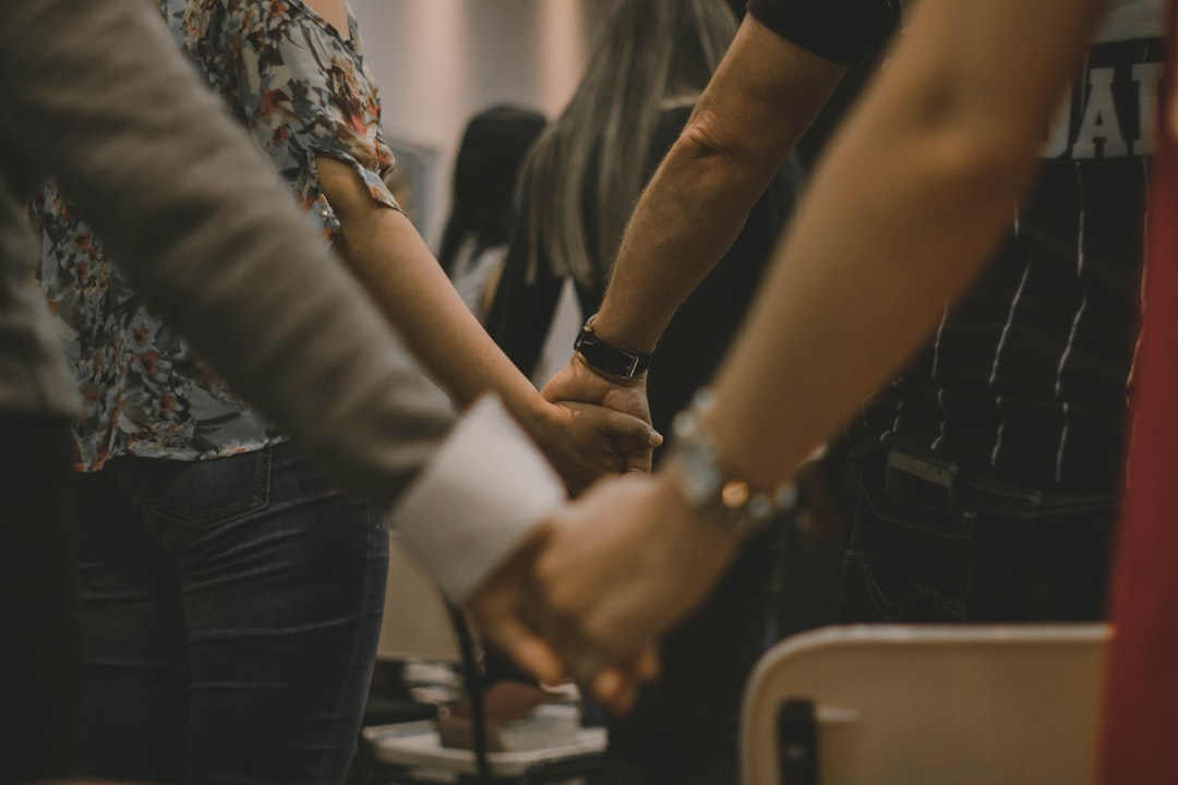 People joining hands in partnership