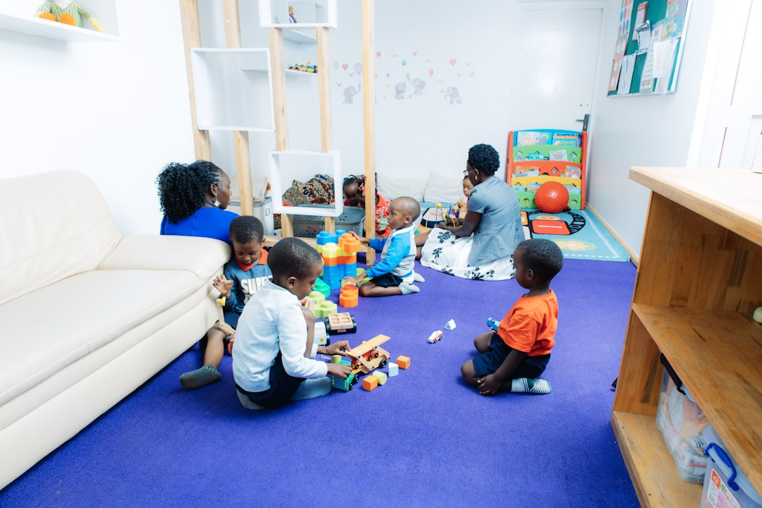 Children learning and playing in a bright child care classroom